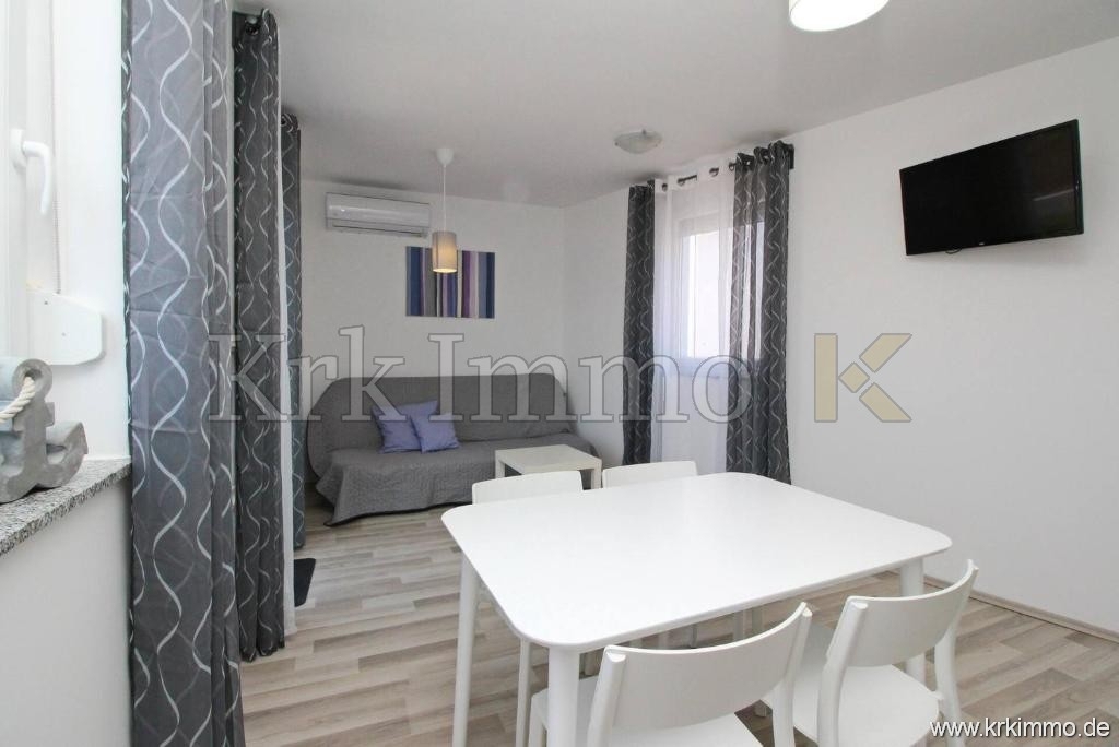 Prvi red ob morju! Moderna apartmajska hiša naprodaj