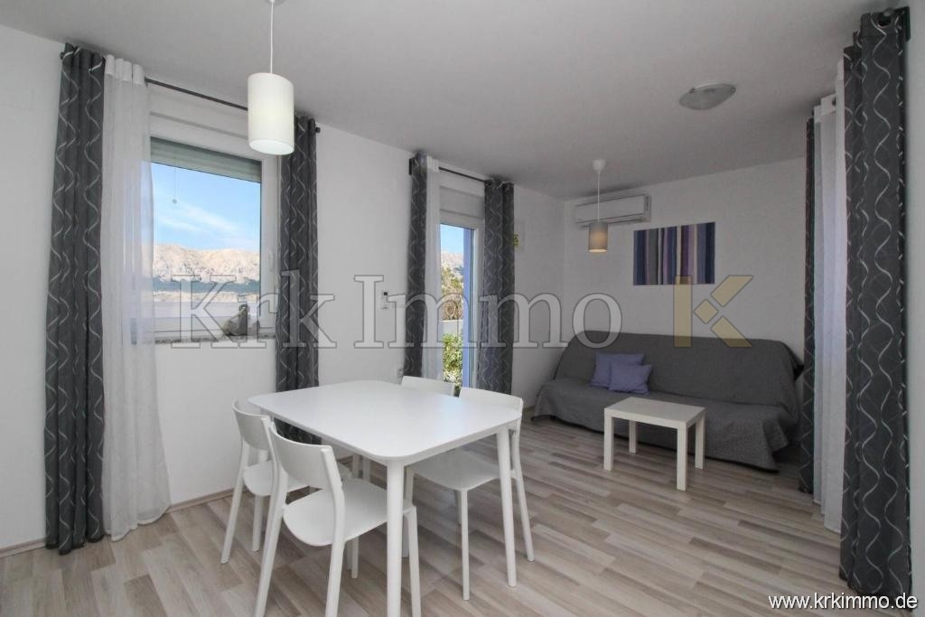 Prvi red ob morju! Moderna apartmajska hiša naprodaj