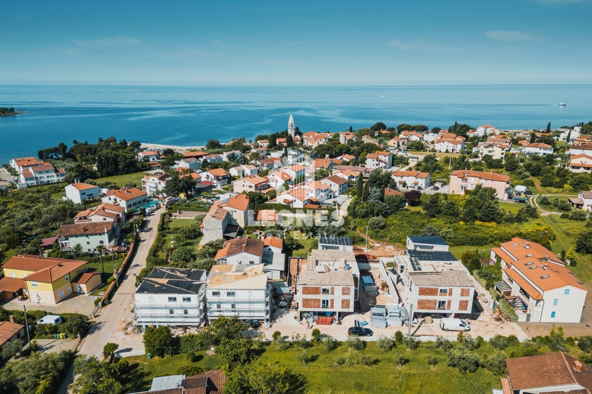 Stanovanje v moderni novogradnji v prvem nadstropju z vrtom na Lovrečici