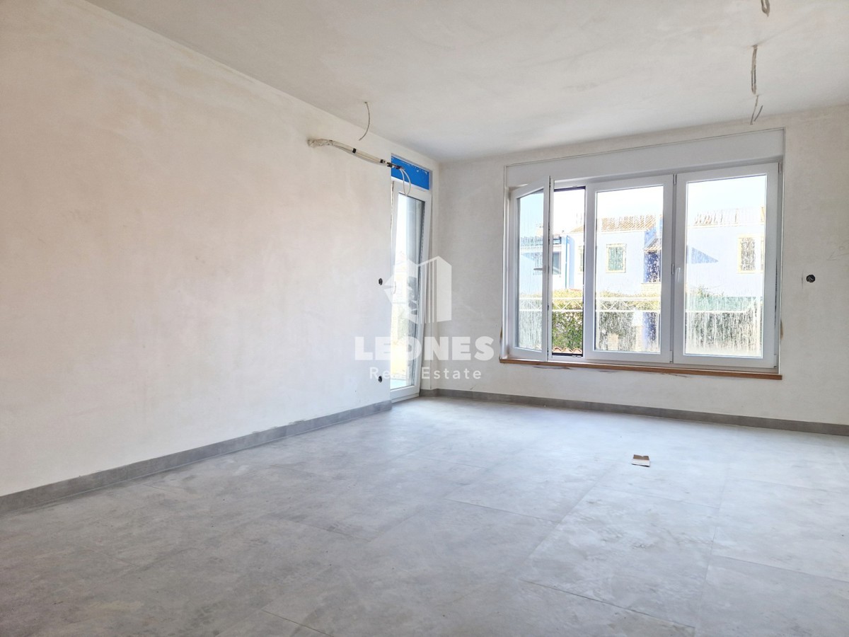 Apartma z vrtom 300 m od morja in plaže v Bašaniji, blizu Umaga