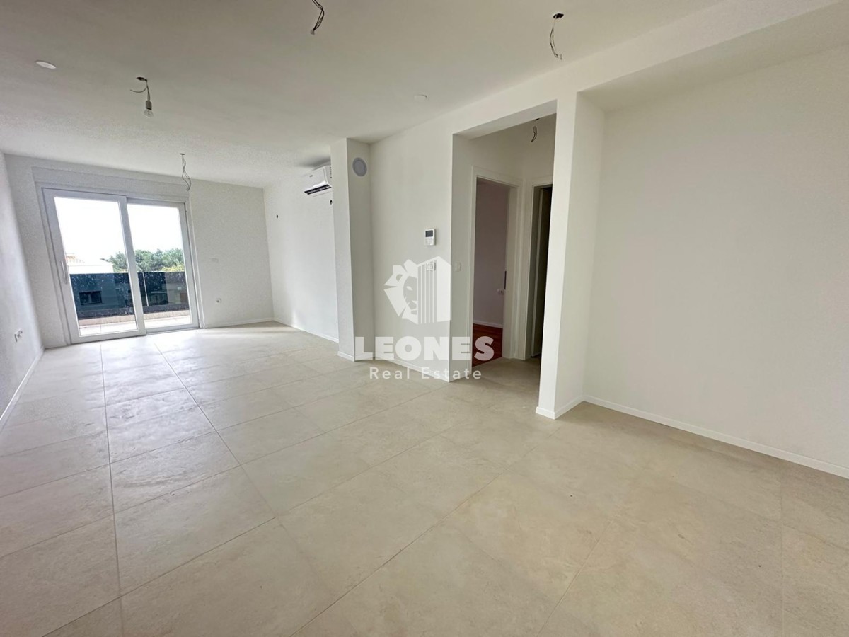 Stanovanje v drugem nadstropju v kvalitetni novogradnji z dvigalom in pogledom na morje v Taru