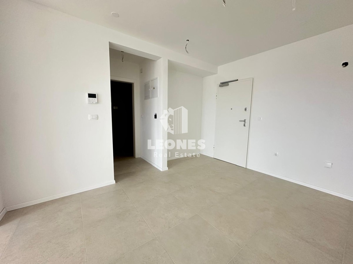 Stanovanje v drugem nadstropju v kvalitetni novogradnji z dvigalom in pogledom na morje v Taru