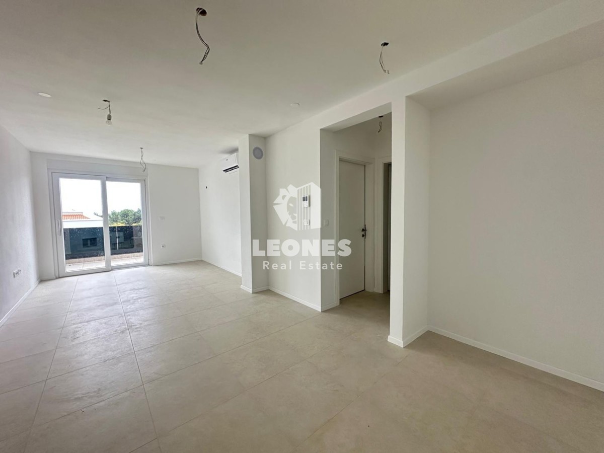 Stanovanje v drugem nadstropju v kvalitetni novogradnji z dvigalom in pogledom na morje v Taru