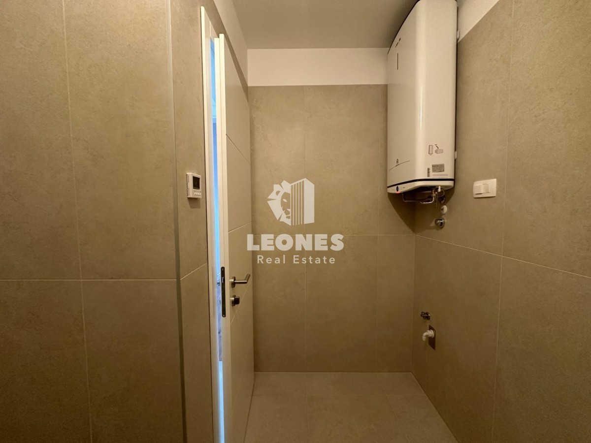 Stanovanje v drugem nadstropju v kvalitetni novogradnji z dvigalom in pogledom na morje v Taru