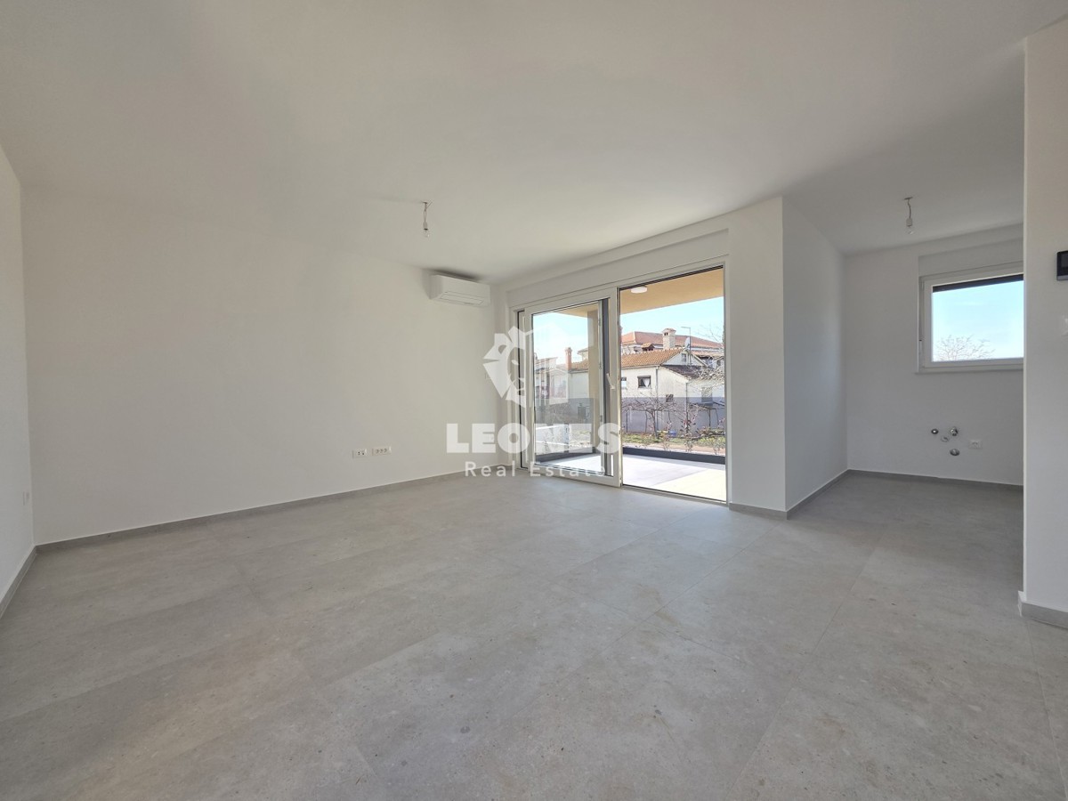 Stanovanje z vrtom v kakovostni novogradnji v Vabrigi, blizu Poreča