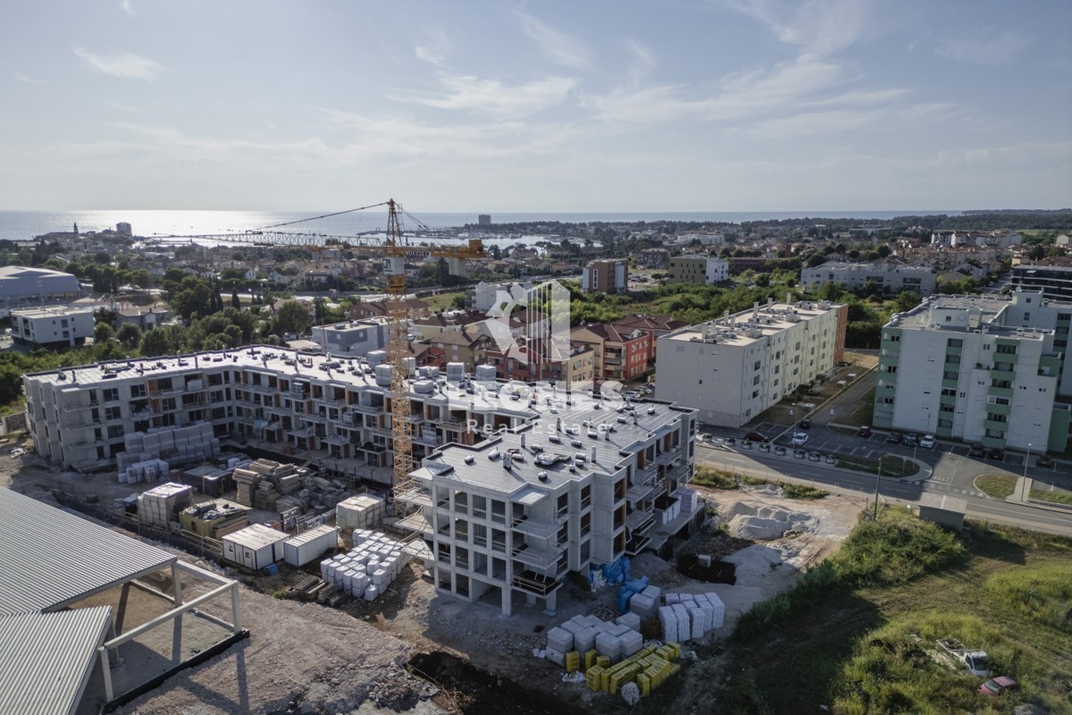 Stanovanje z garažnim parkirnim mestom v kvalitetni novogradnji v Umagu