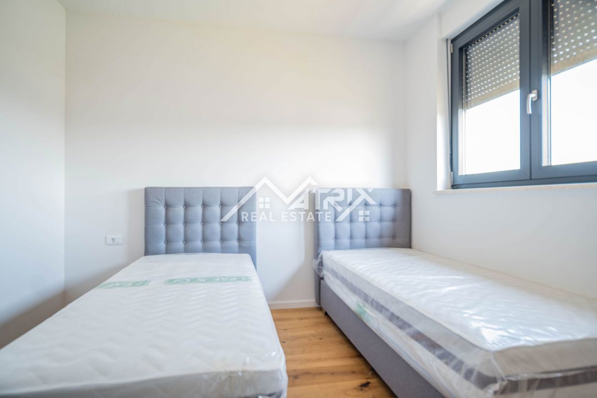 Pulj, kakovostno trisobno stanovanje z ložami, shrambo in 2 parkirnima mestoma