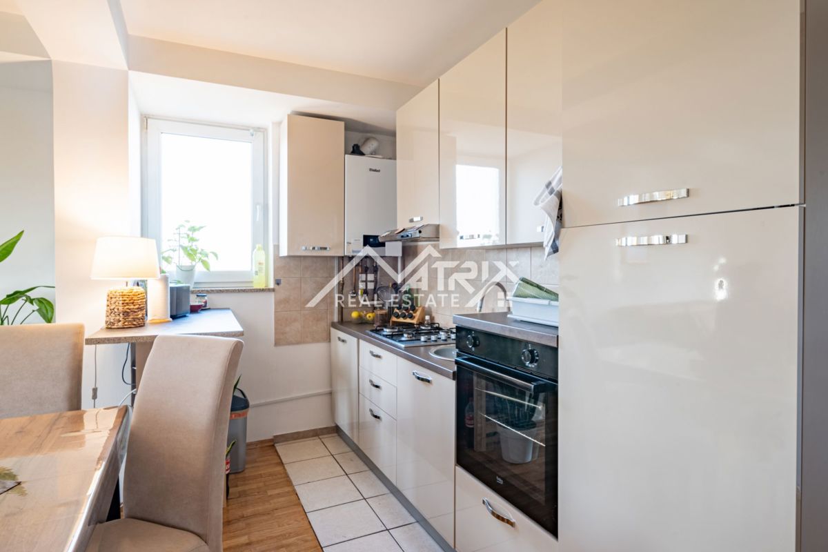  Vinkovci, trosobno stanovanje z balkonom v centru mesta