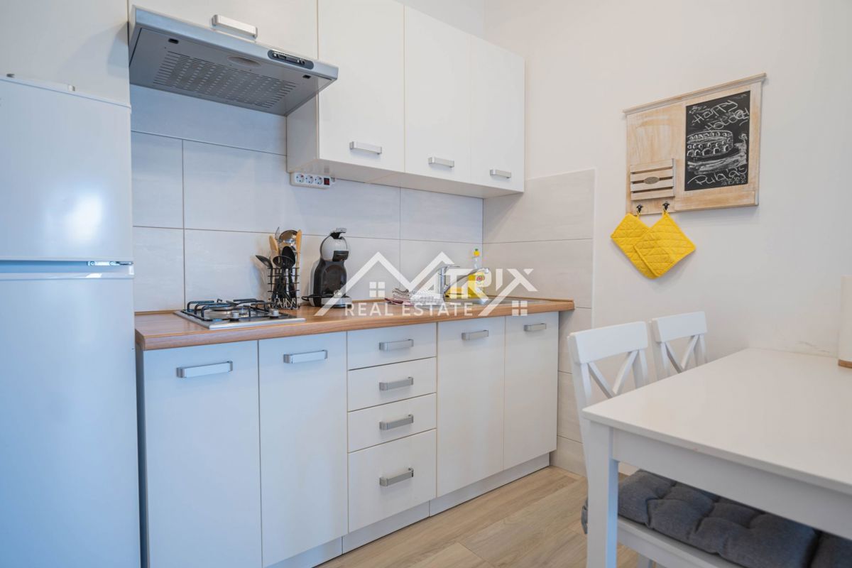 Pulj, dvosobno pritlično stanovanje s pokrito teraso