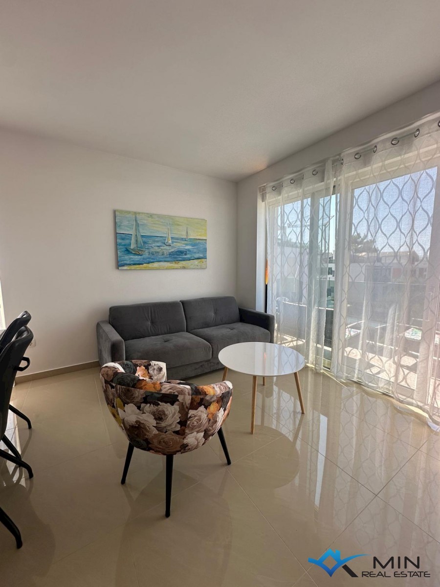 Apartma s strešno teraso in pogledom na morje v Novigradu