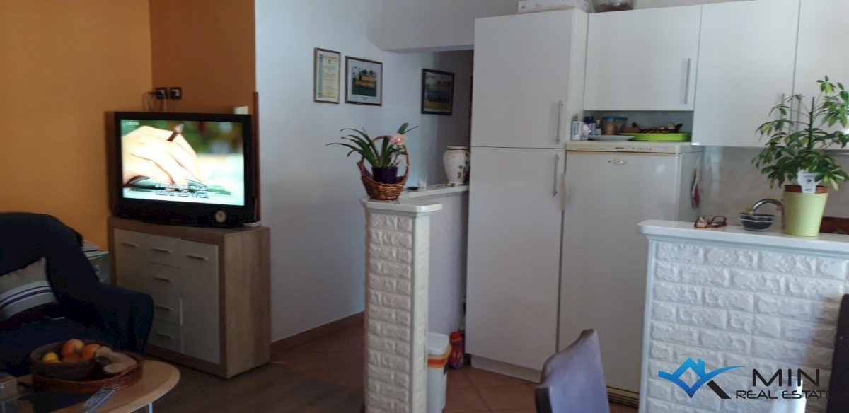 Stanovanje v pritličju + gradbena parcela - Novigrad