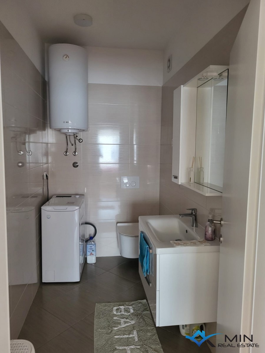 Apartma 500 m od morja s strešno teraso v Novigradu