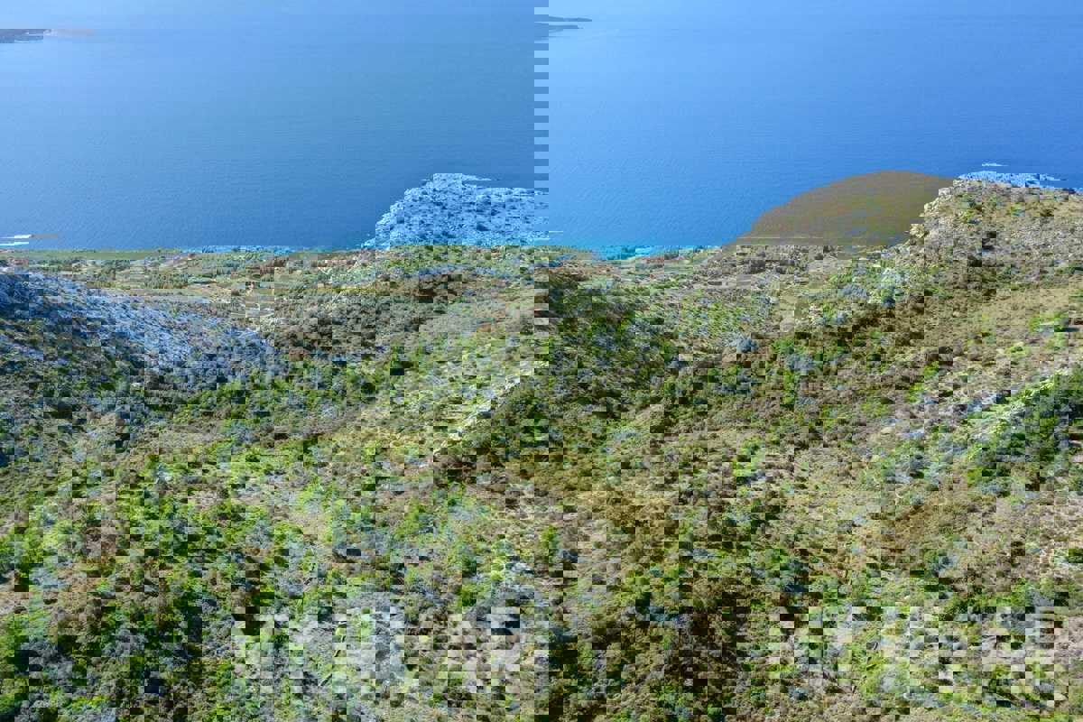 Zemljišče s panoramskim razgledom in hišo