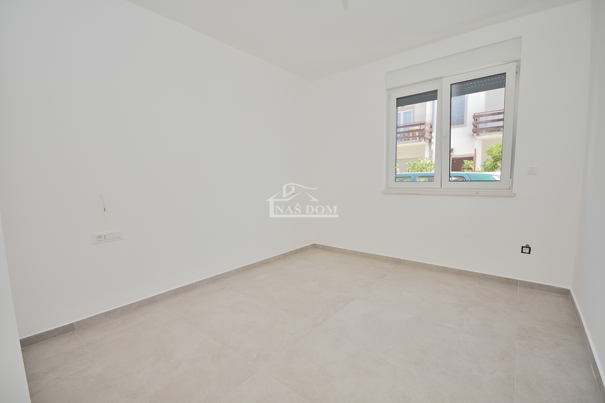 Vodice - **NOVOGRADNJA** S2 stanovanje s vrtom