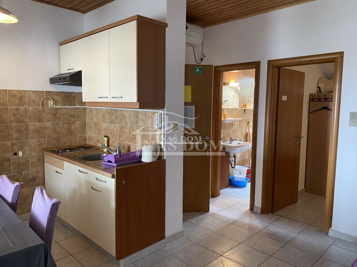 Hiša s 7 apartmaji, 100 m do plaže