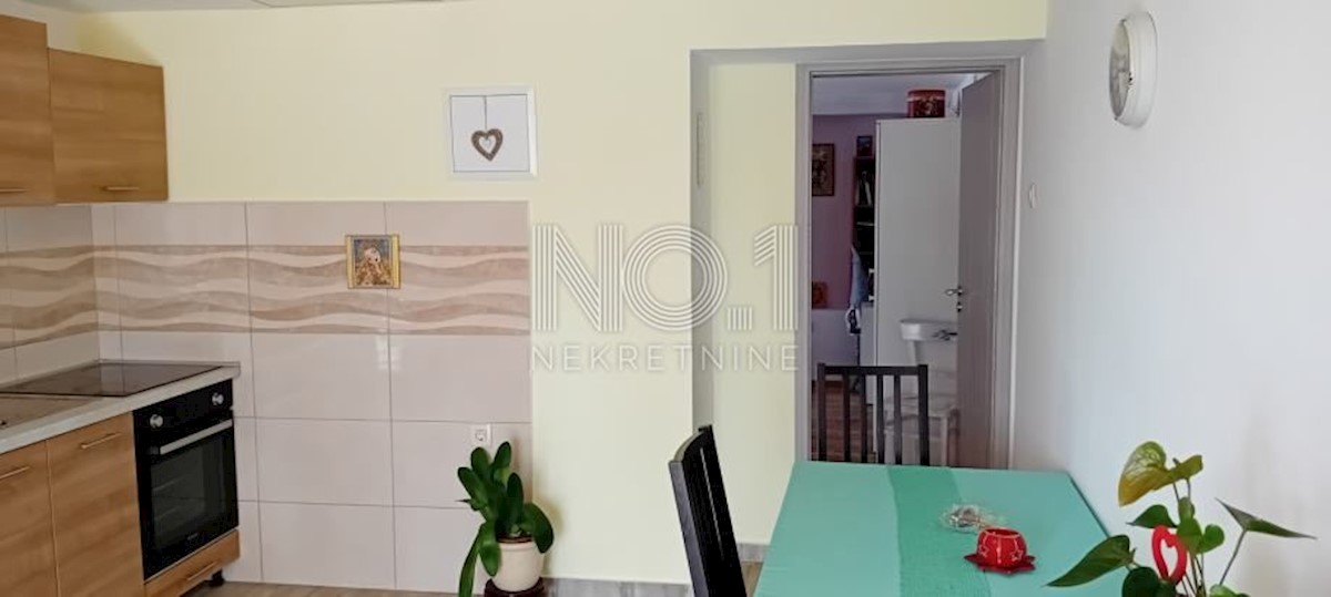 Permani - družinska hiša in gradbišče