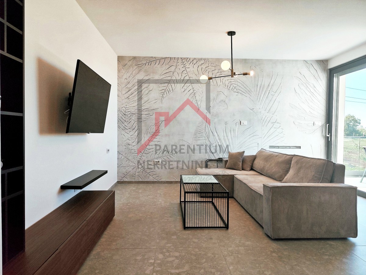 Istra, območje Poreča - Dizajnersko stanovanje s tremi spalnicami in pogledom na morje - novogradnja