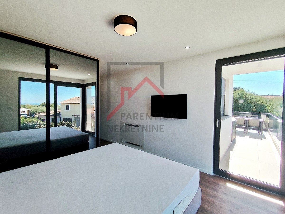 Istra, območje Poreča - Dizajnersko stanovanje s tremi spalnicami in pogledom na morje - novogradnja