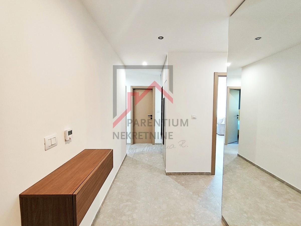 Istra, območje Poreča - Dizajnersko stanovanje s tremi spalnicami in pogledom na morje - novogradnja