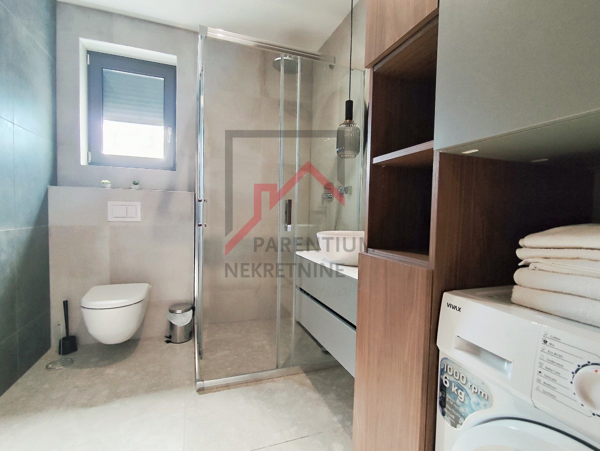 Istra, območje Poreča - Dizajnersko stanovanje s tremi spalnicami in pogledom na morje - novogradnja