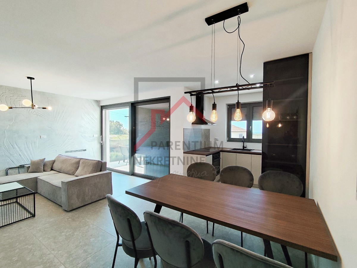 Istra, območje Poreča - Dizajnersko stanovanje s tremi spalnicami in pogledom na morje - novogradnja