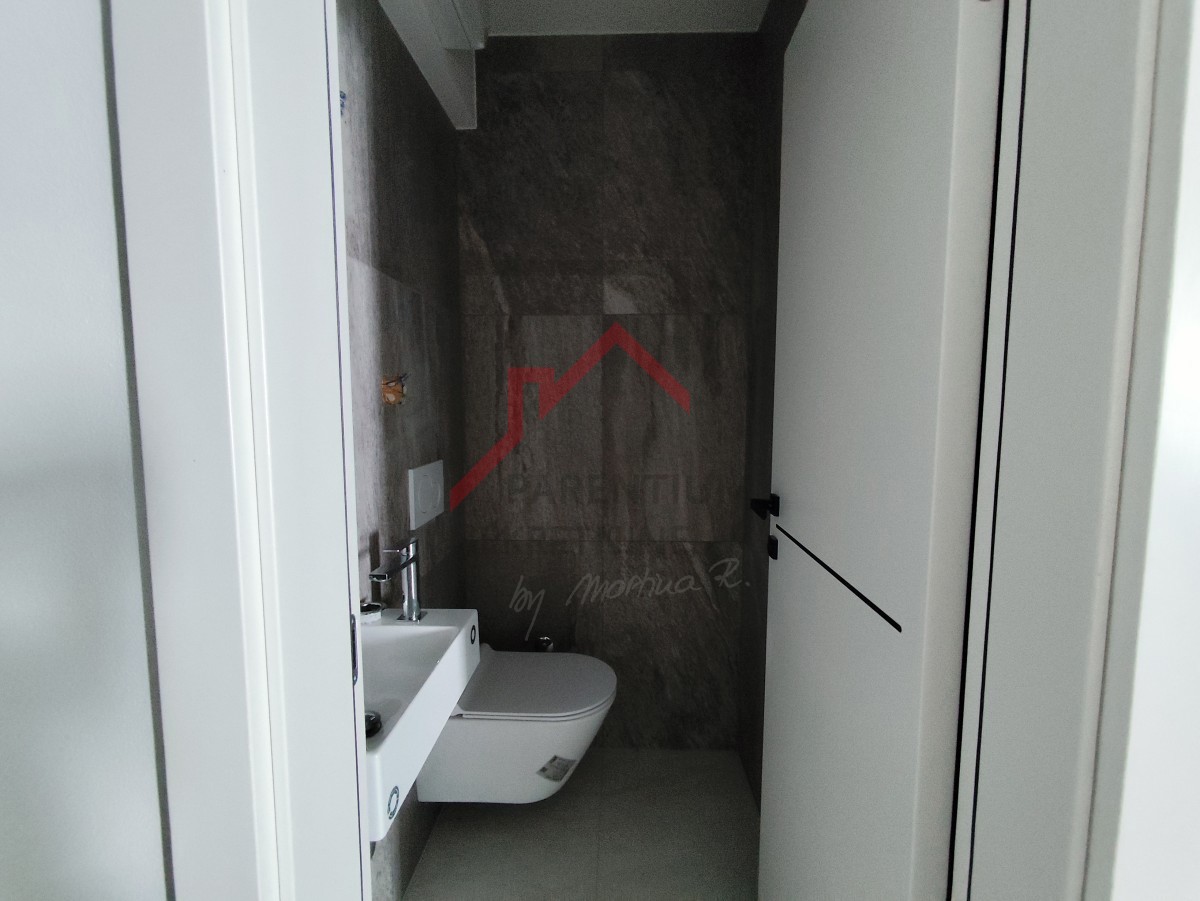 Istra, center Poreča - moderno dvosobno stanovanje z garažo v urbani novogradnji