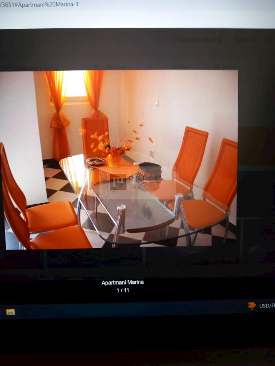 Apartmajska hiša s kamnito fasado
