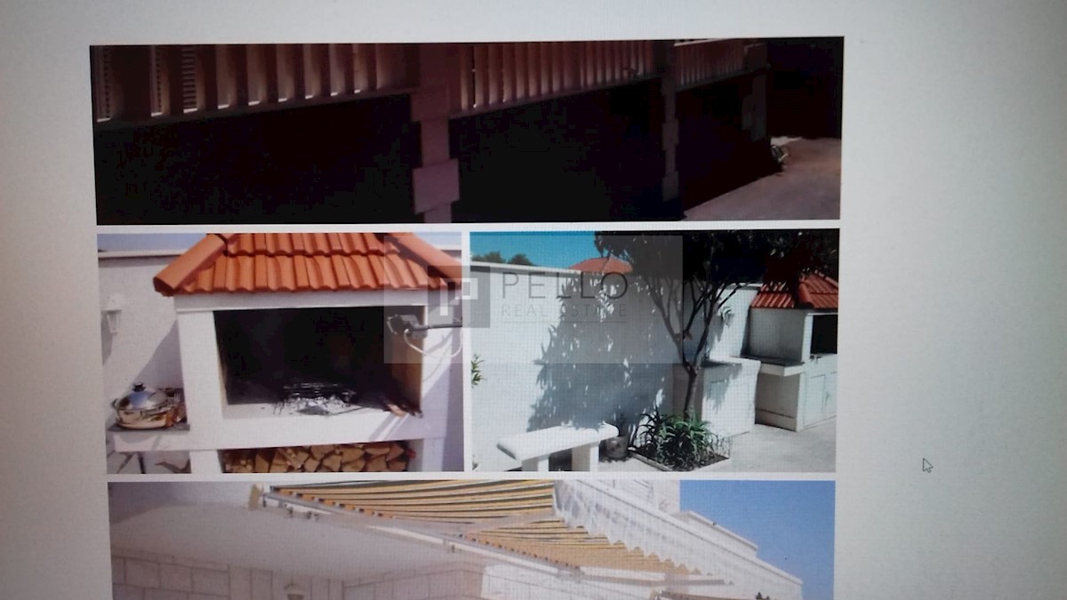 Apartmajska hiša s kamnito fasado