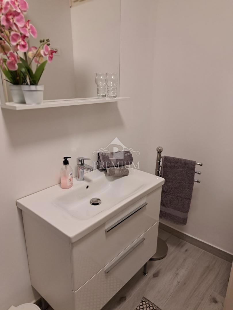 DVOSOBNO STANOVANJE Z VRTOM IN PARKIRIŠČEM