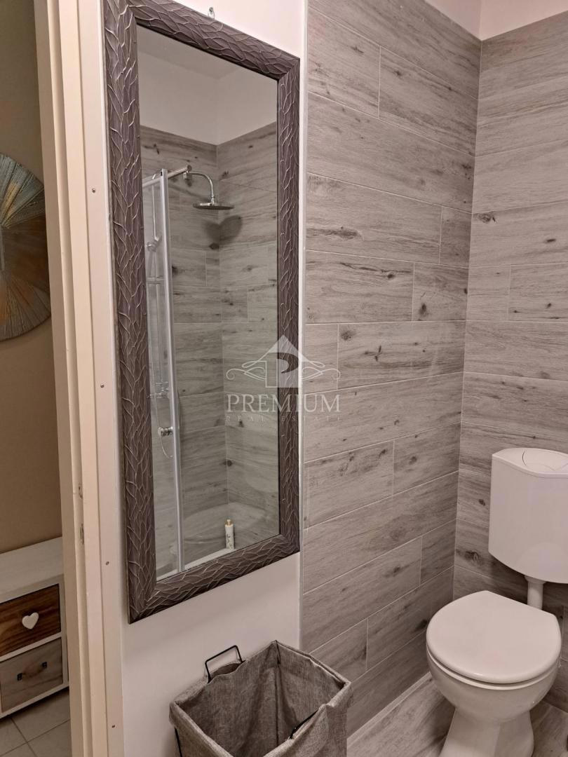 DVOSOBNO STANOVANJE Z VRTOM IN PARKIRIŠČEM