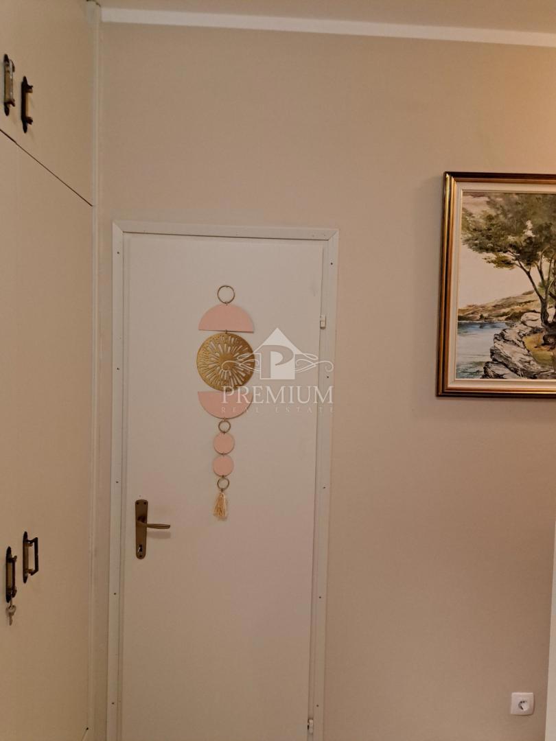 DVOSOBNO STANOVANJE Z VRTOM IN PARKIRIŠČEM