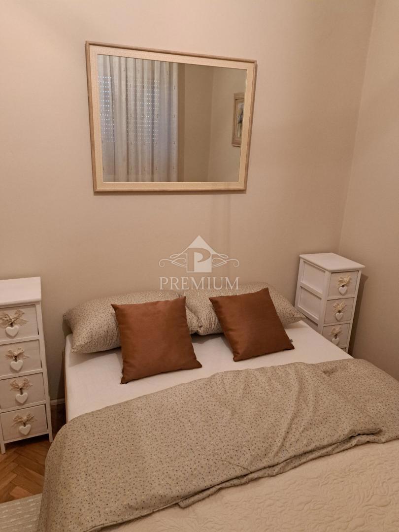 DVOSOBNO STANOVANJE Z VRTOM IN PARKIRIŠČEM