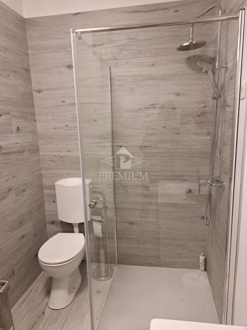 DVOSOBNO STANOVANJE Z VRTOM IN PARKIRIŠČEM