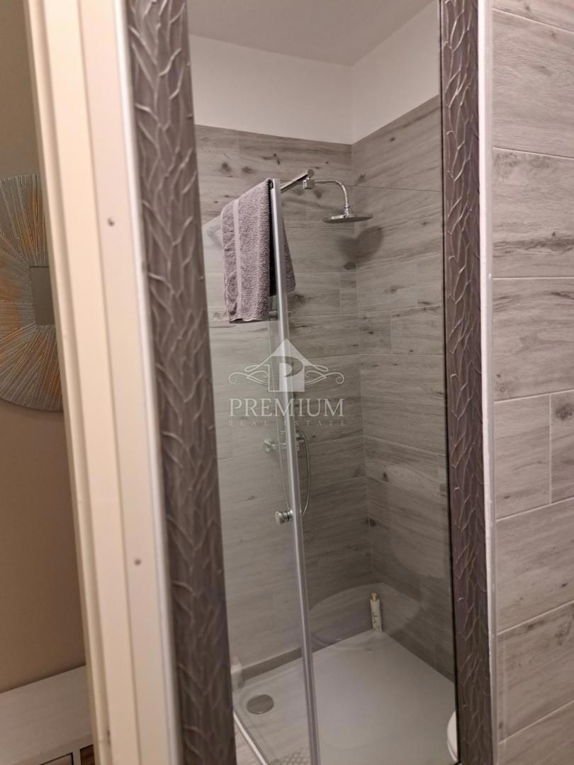 DVOSOBNO STANOVANJE Z VRTOM IN PARKIRIŠČEM