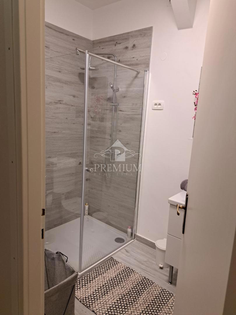 DVOSOBNO STANOVANJE Z VRTOM IN PARKIRIŠČEM