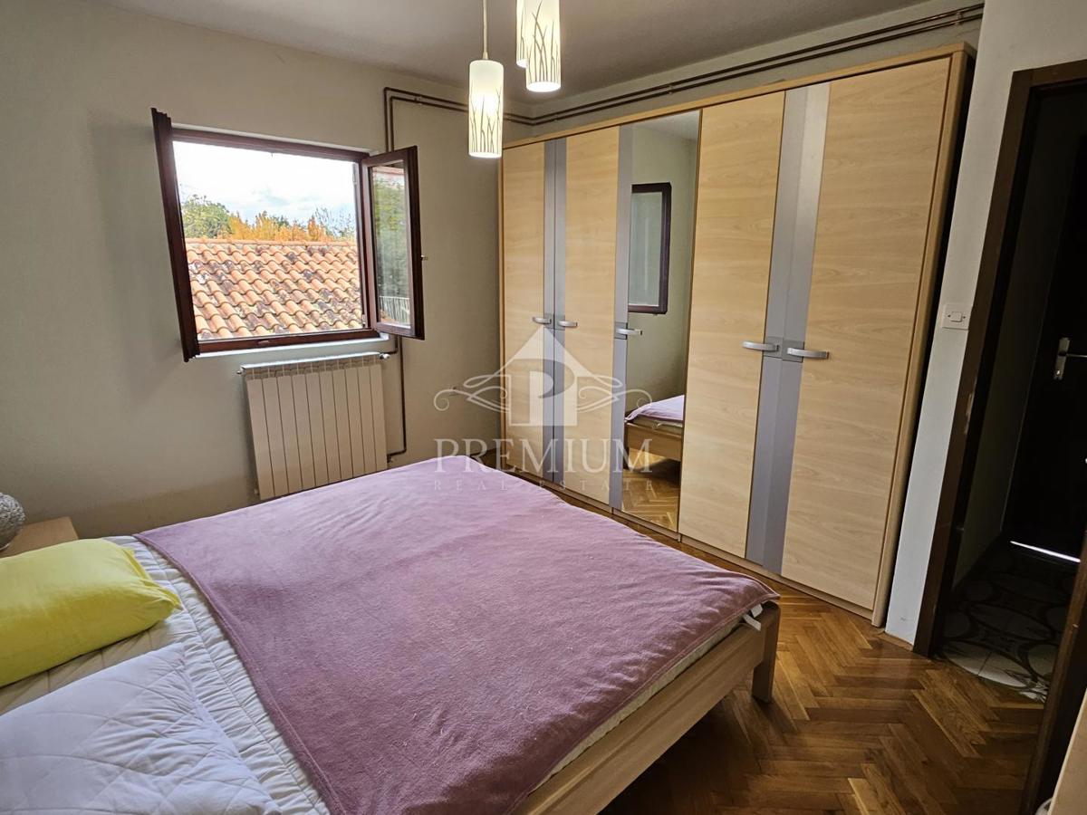 STANOVANJE S PARKIRIŠČEM NA MIRNI LOKACIJI