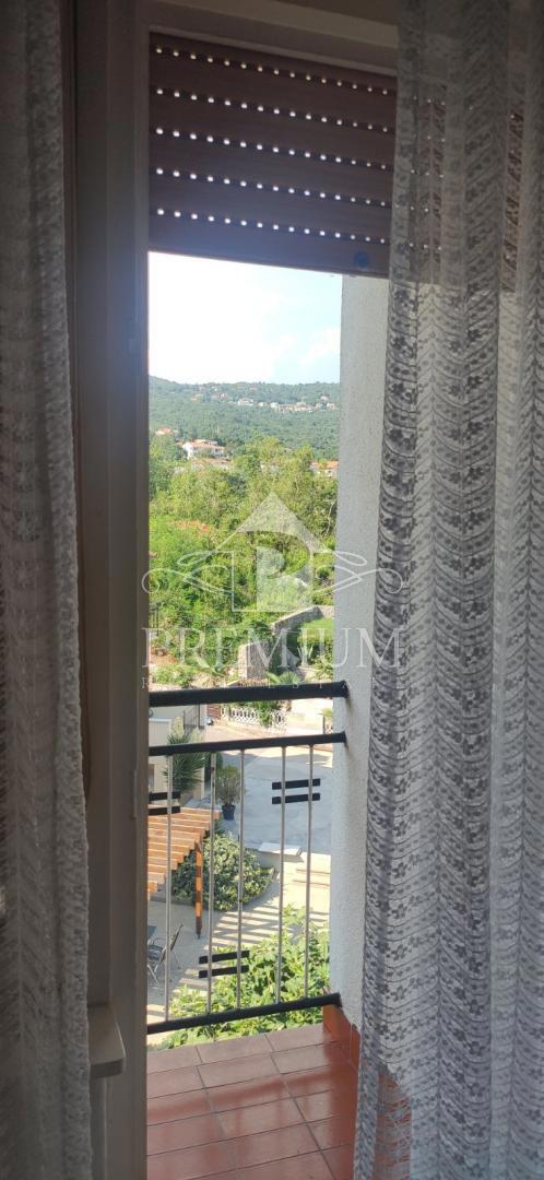 DVONETAŽNO STANOVANJE Z GARAŽO IN VRTOM