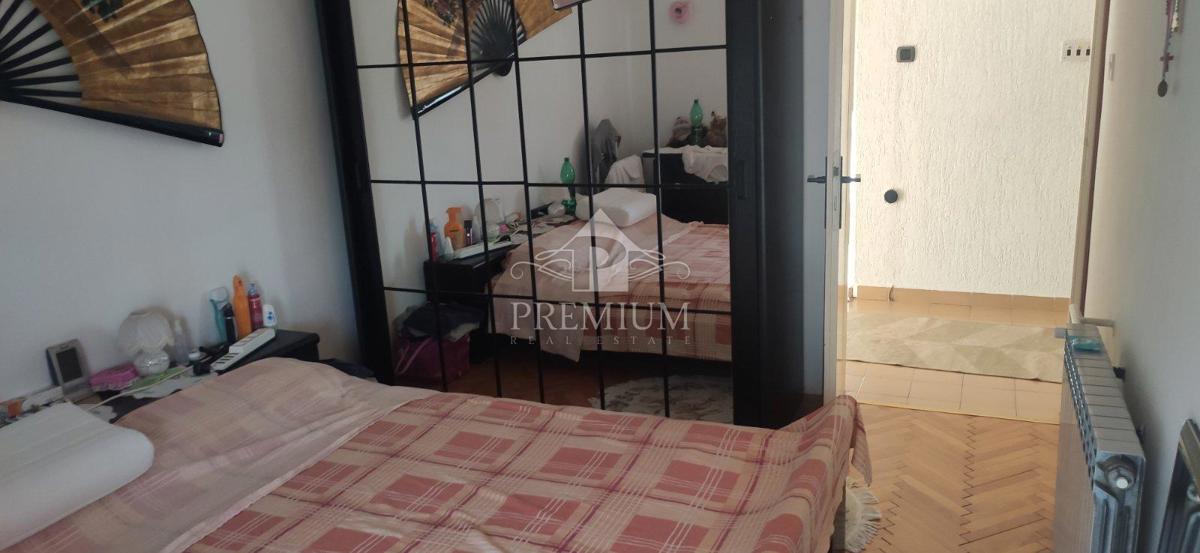 DVONETAŽNO STANOVANJE Z GARAŽO IN VRTOM