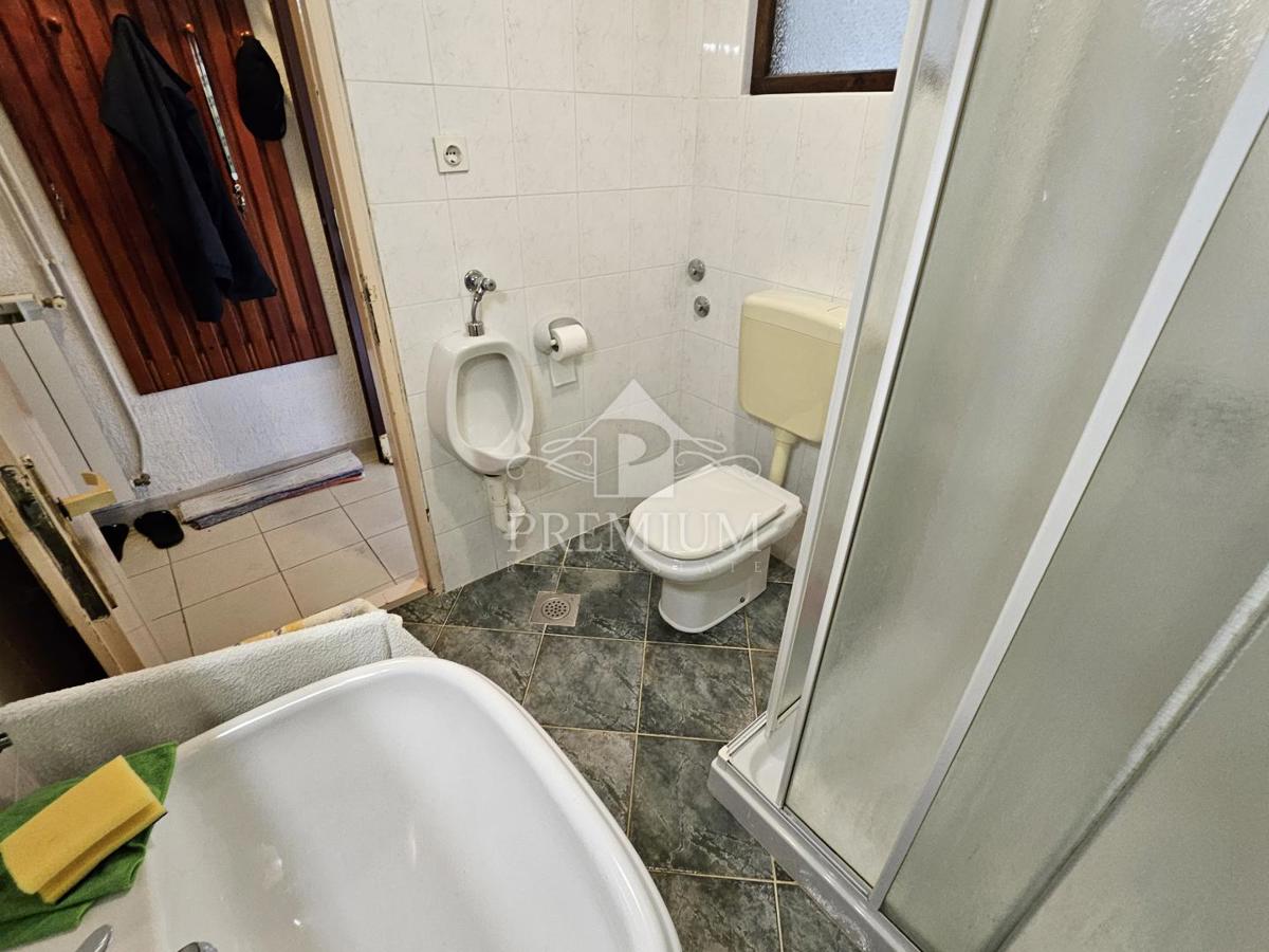 STANOVANJE Z GARAŽO IN VRTOM, MIRNA LOKACIJA