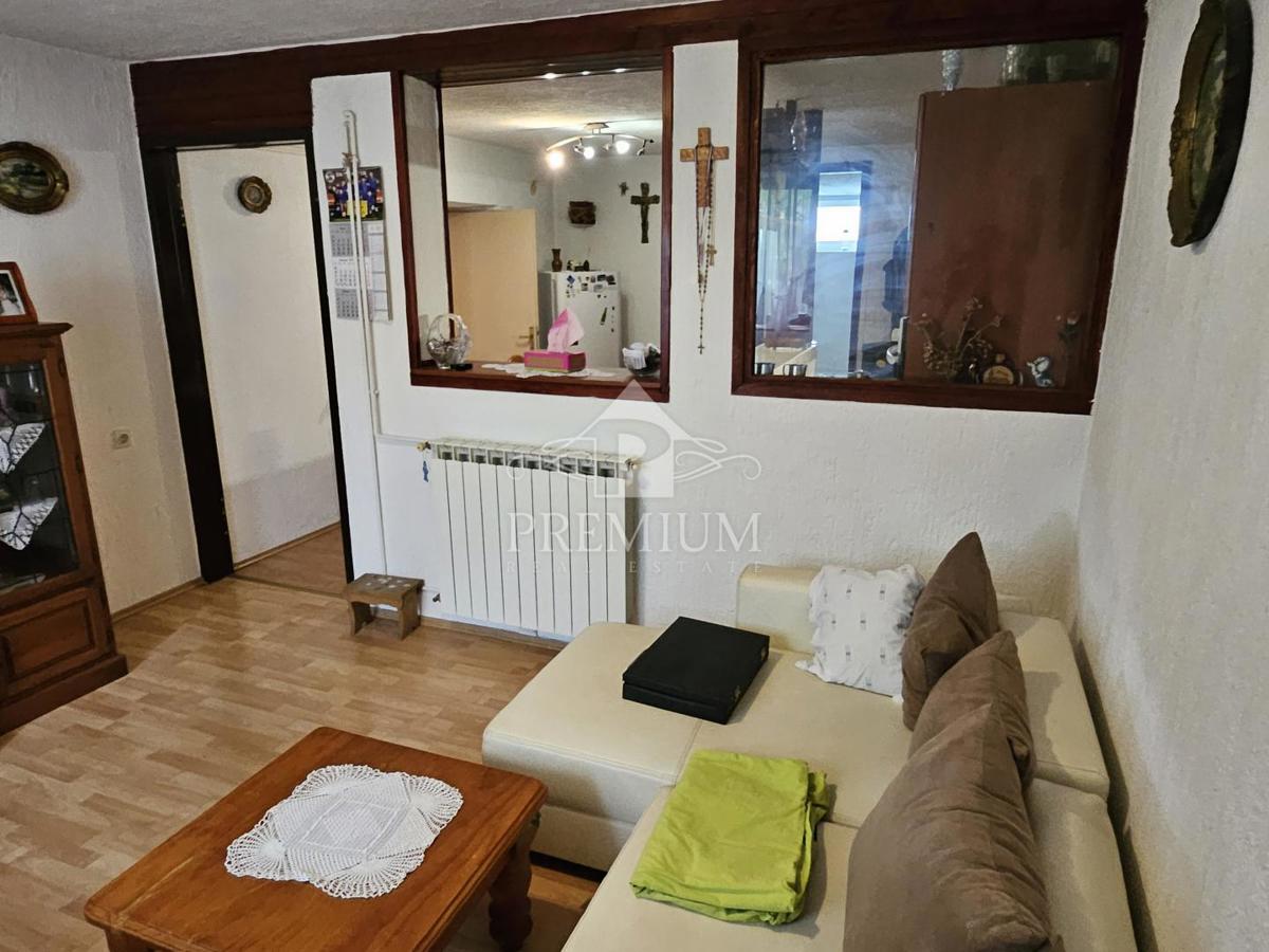 STANOVANJE Z GARAŽO IN VRTOM, MIRNA LOKACIJA