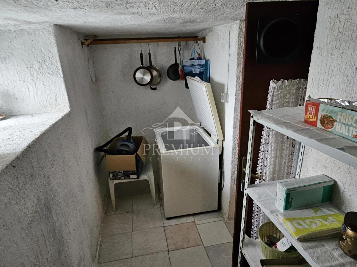 STANOVANJE Z GARAŽO IN VRTOM, MIRNA LOKACIJA