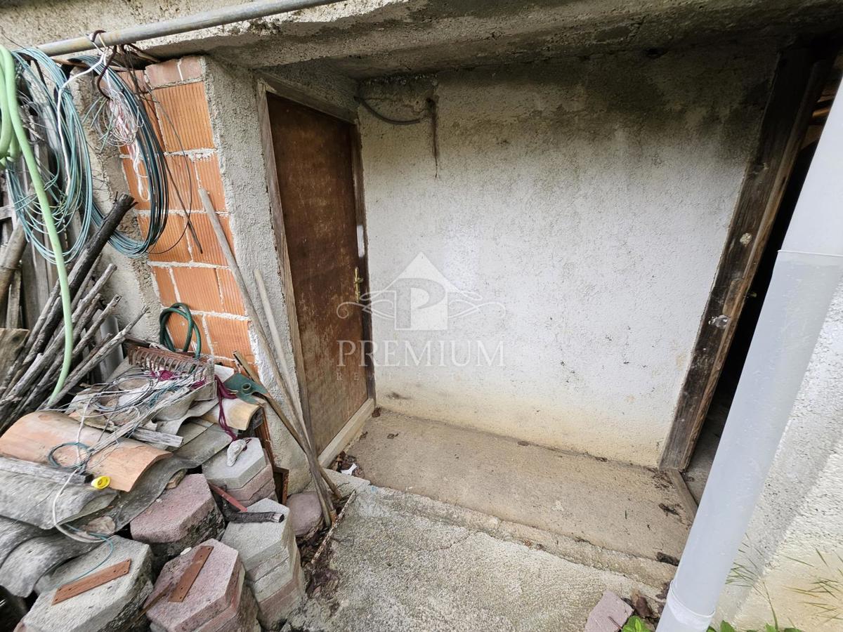 STANOVANJE Z GARAŽO IN VRTOM, MIRNA LOKACIJA