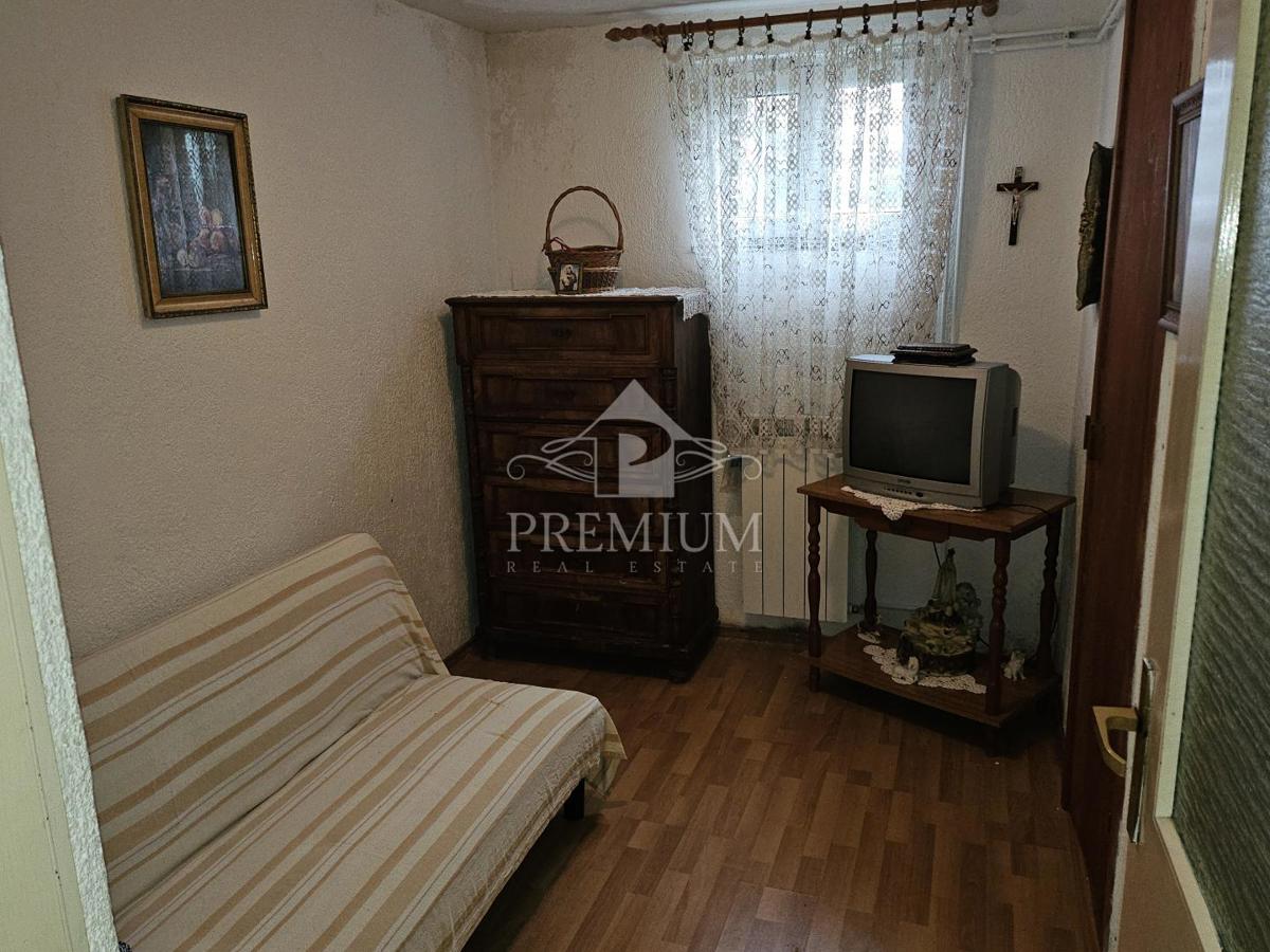 STANOVANJE Z GARAŽO IN VRTOM, MIRNA LOKACIJA