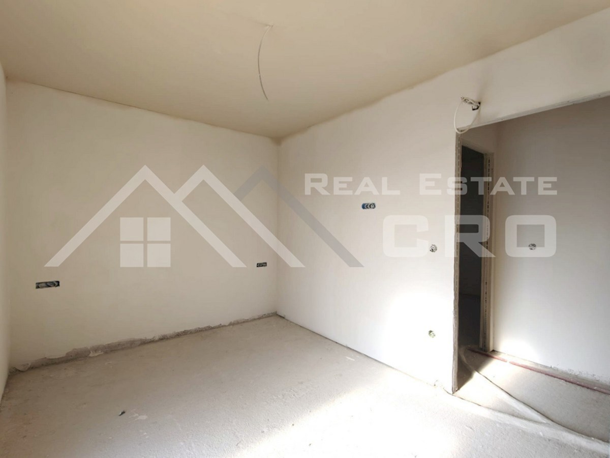 Nepremičnine Čiovo – Dvosobna stanovanja v novogradnji z garažo, dvigalom in bazenom, naprodaj