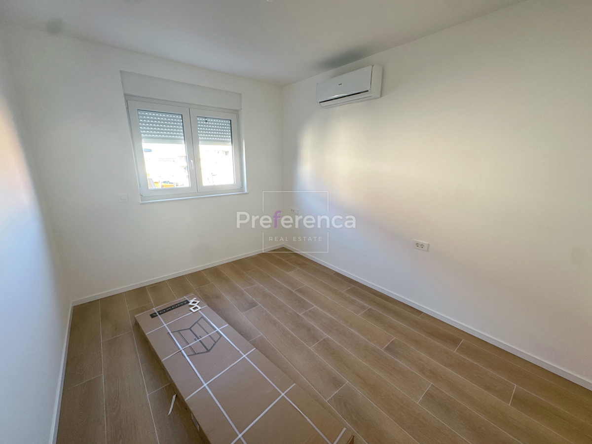 Povljana - dvosobno stanovanje v pritličju z vrtom