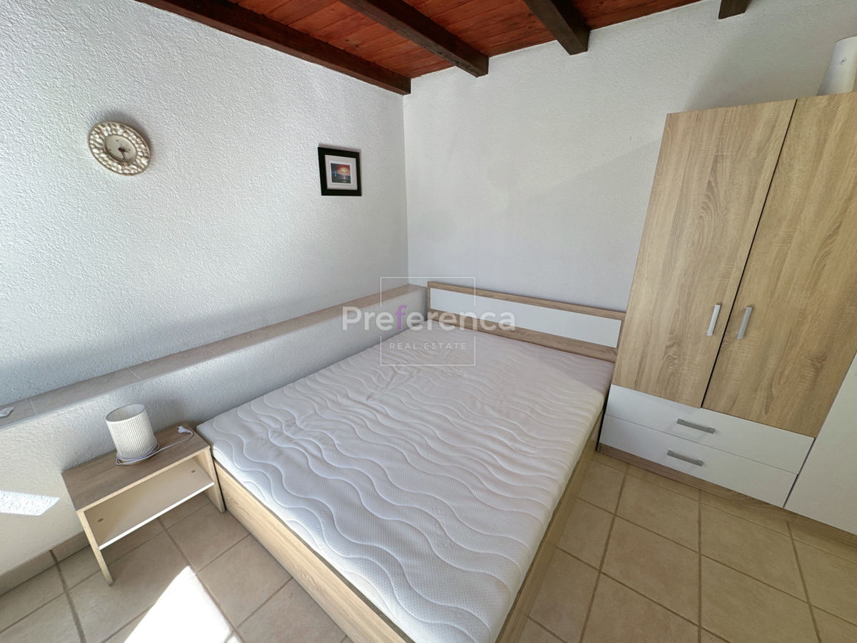 Kustići - vrstna hiša s 4 enotami