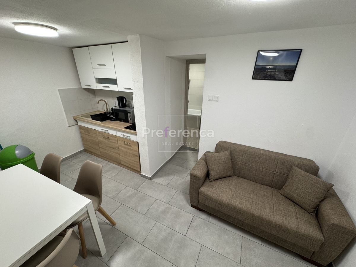 Kustići - vrstna hiša s 4 enotami