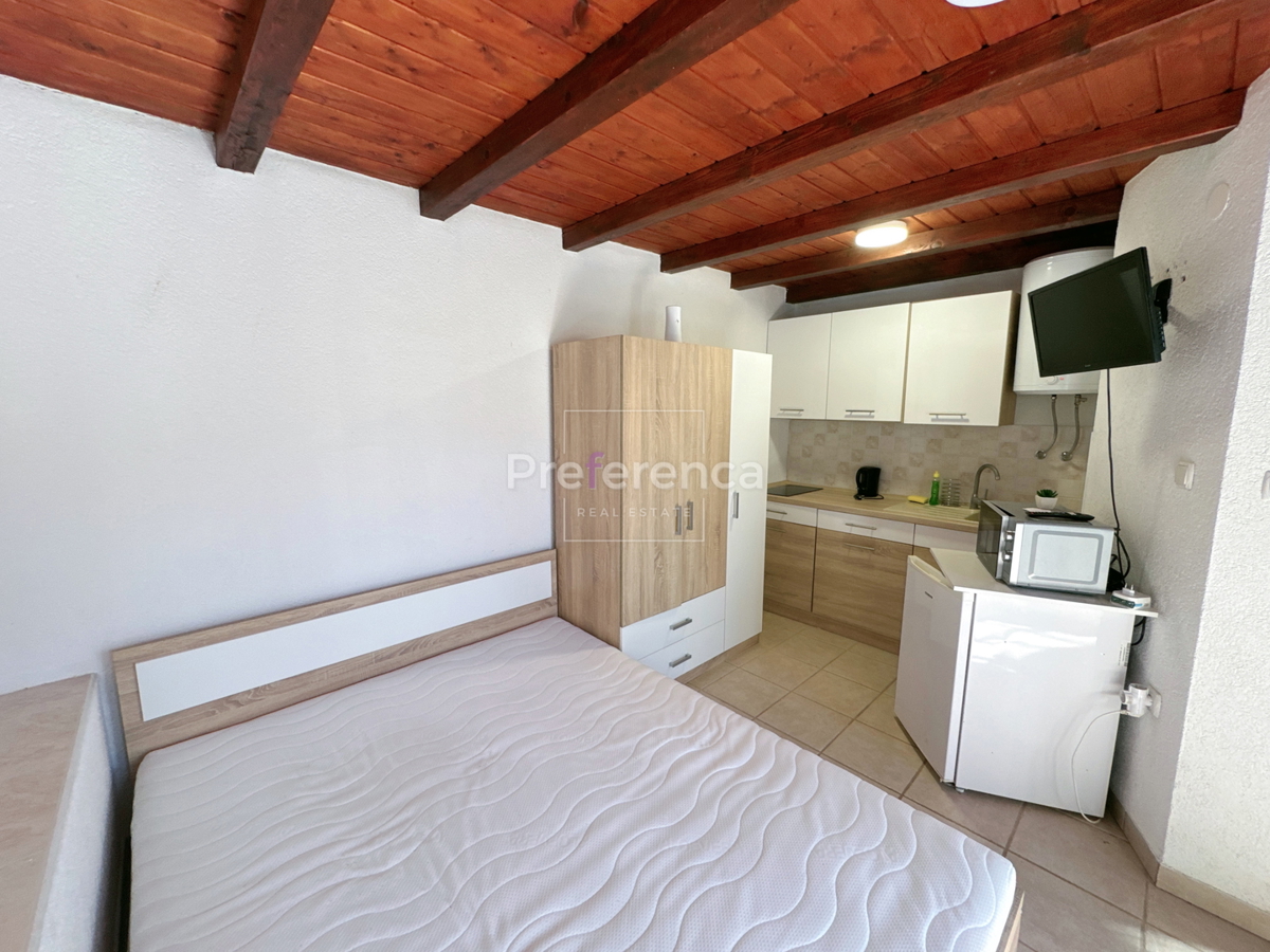 Kustići - vrstna hiša s 4 enotami