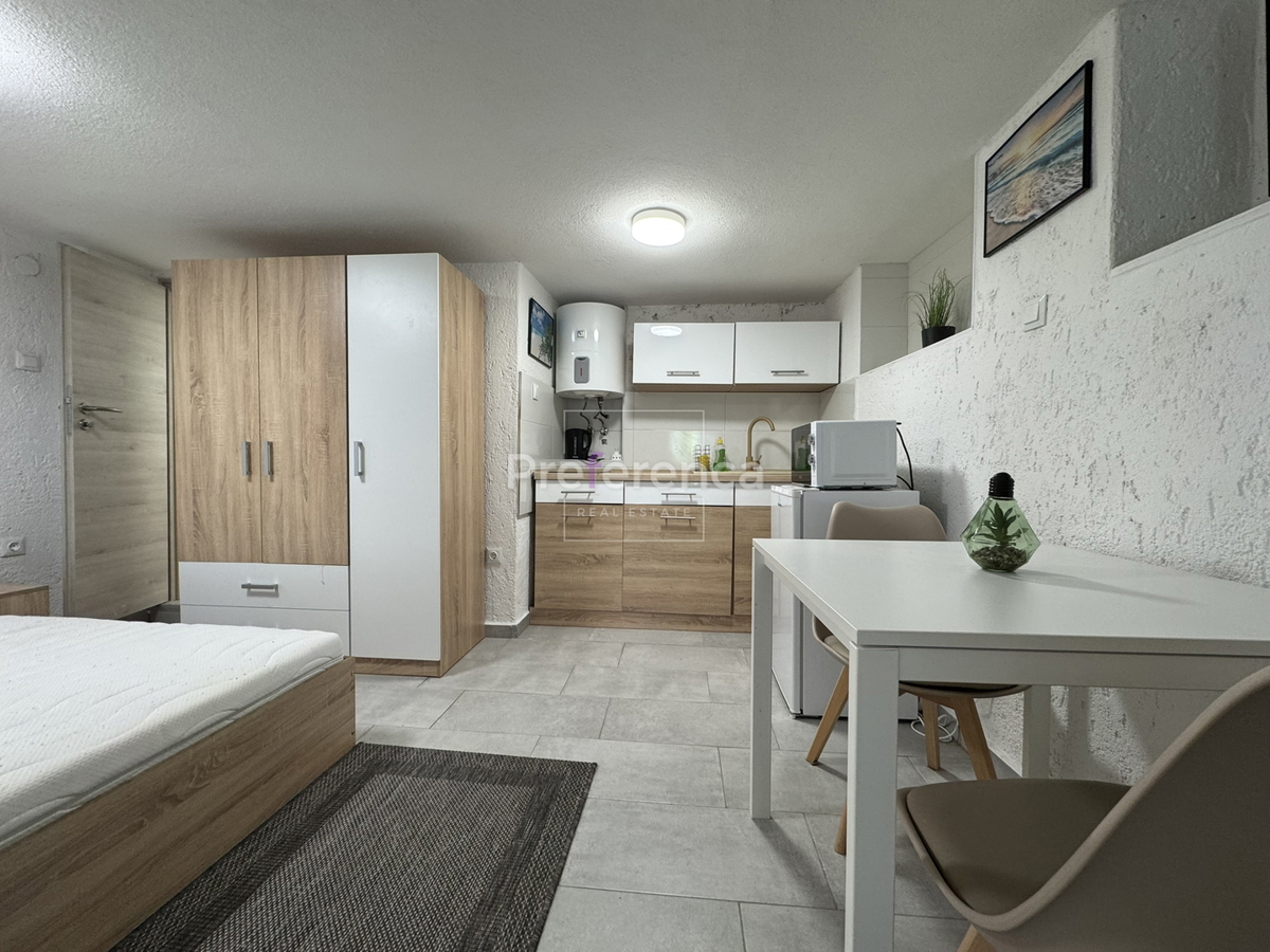 Kustići - vrstna hiša s 4 enotami