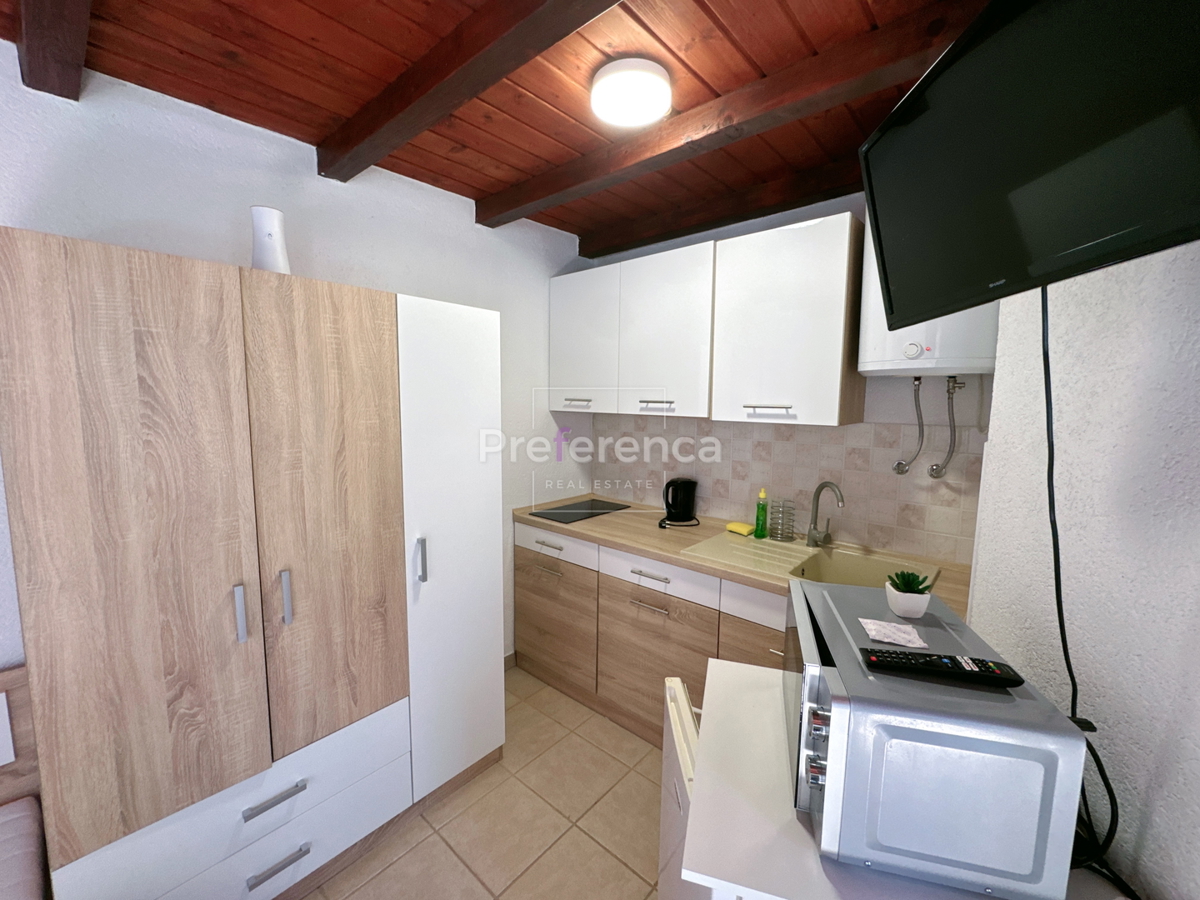 Kustići - vrstna hiša s 4 enotami